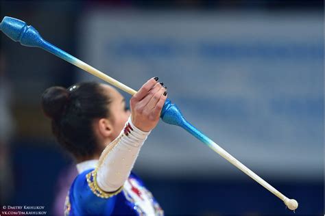 Rhythmic gymnastics is an event in international women's gymnastics that combines strength, power, extreme flexibility its specific components are rope, hoop, ball, clubs, and ribbon routines. #clubs | Rhythmic gymnastics, Gymnastics, Club