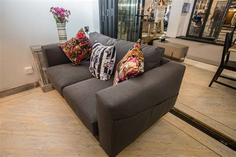 A cushion arrangement for minimalists, two individual cushions makes for a simple, chic aesthetic. Contemporary grey sofa with patterned cushions at Grand ...