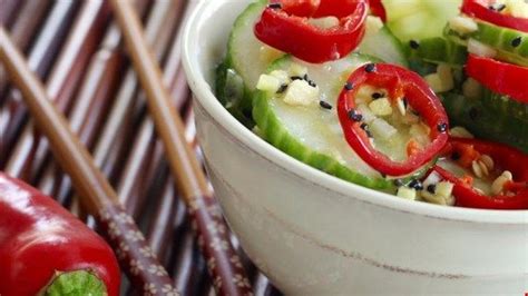 Marinate beef with 2 tbsp. Sliced cucumbers and red chile peppers are tossed with a rice vinegar and sesame oil dressing ...