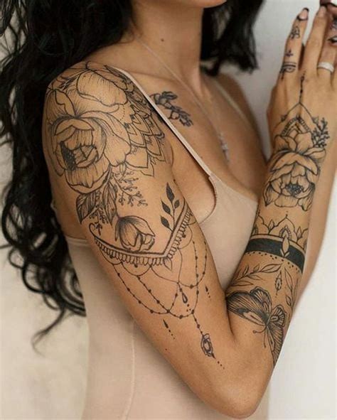 The design features multiple contrasting patterns and descends down the wearer's arm before ending on the wearer's middle finger. awesome tattoos #Mandalatattoo | Sleeve tattoos for women ...
