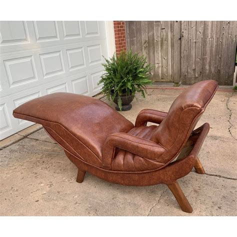 An electrically operated, rising and reclining lounge chair designed to assist the user with sitting and rising from the chair. 1970s Vintage Deluxe Electric Contour Lounge Chair | Chairish