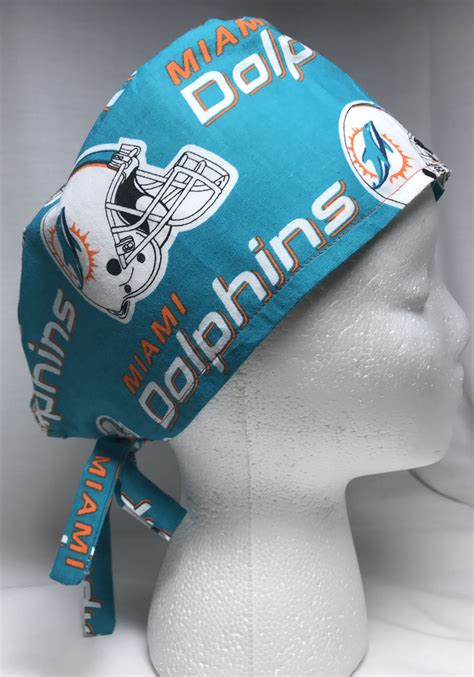 Miami dolphins caps & hats from the official nfl shop (all prices are correct when pinned & may change). Miami Dolphins Surgical Scrub Cap by SEWNLOVEBYCAROL on ...