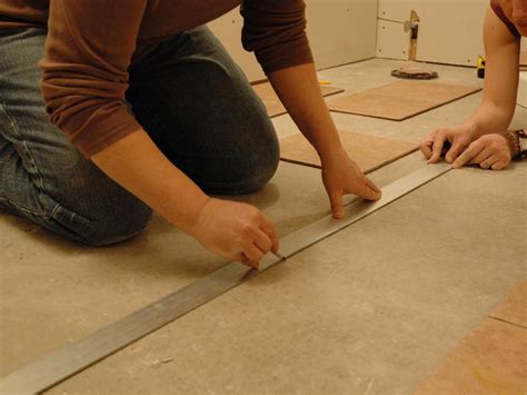 We chose the easy way. How to Install Tile on a Bathroom Floor | HGTV