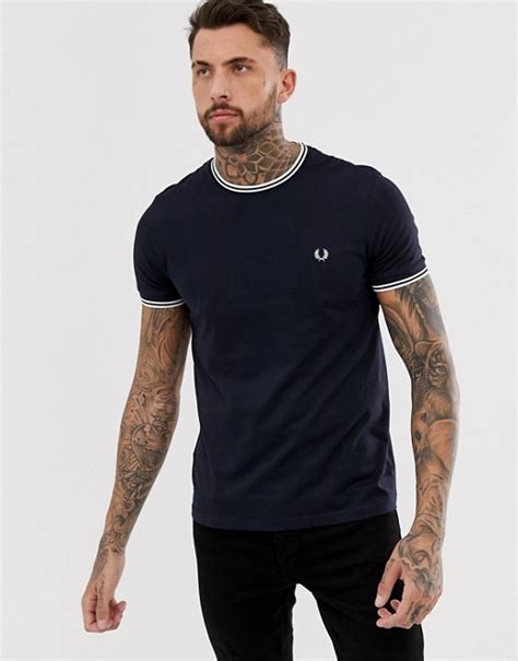 Undeniably british, indisputably fred perry, the authentic collection celebrates classic design. Fred Perry twin tipped t-shirt in navy | ASOS