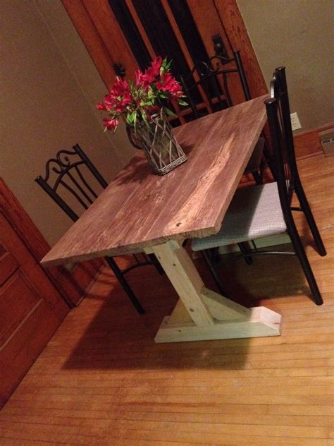 Build a stylish table with these free diy farmhouse table plans. Diy harvest table with reclaimed walnut tabletop. | Harvest table, Rustic dining table, Dining table