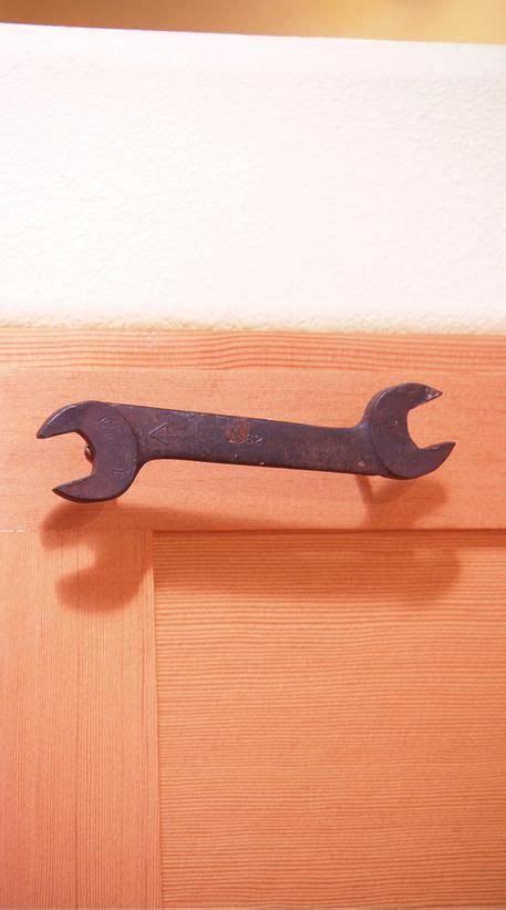 How much a kitchen remodeling should cost. cabinet hardware created using a bunch of antique wrenches ...