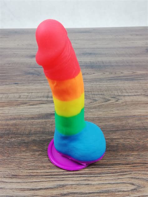 Watch fun with the dildo! Rainbow dildo - Latexskin