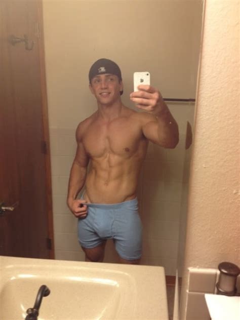 Notoriety has robbed me of work, he says. baseball cap backwards bathroom mirror self portrait image ...