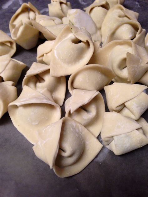 Cut each half into 6 equal pieces (12 pieces altogether) lay a wonton wrapper on a clean cutting board. Wonton Wrapper Tortellini | Homemade tortellini, Wonton ...