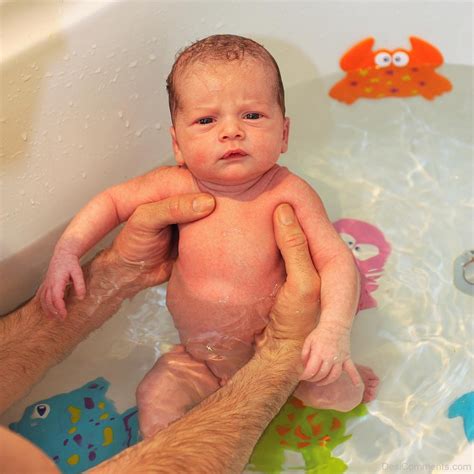 It's really a toss up. Baby Bathing In Tub - DesiComments.com