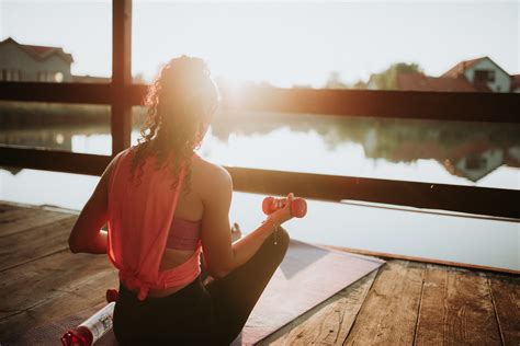 Here are 15 side gigs to consider when you need some extra income. Woman working out on the wooden terrace on lake | Nenad ...