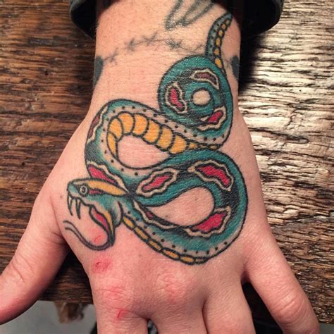 Selecting a snake for a tattoo can be exciting. 18 Best Old School Snake Tattoo Designs | PetPress