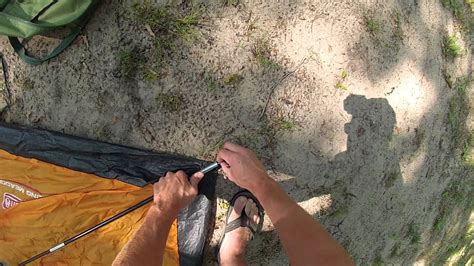 You pull the cord on the hub system, and the center room pops open. How To Put Up A Coleman Tent - YouTube