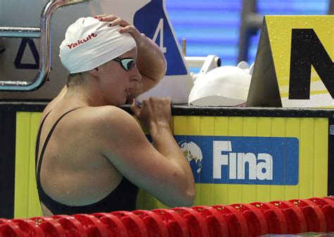 154 pounds (70kg) star sign: Katie Ledecky prepares for the 800 meter finals at FINA ...