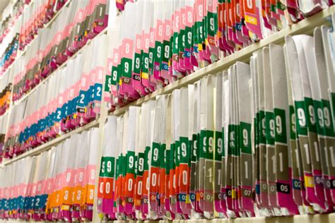 Let us assist you with configuring your office space at no charge. File Cabinets Full Of Medical Records Stock Photo ...