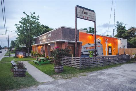 Décor reflects on american industry with iron, concrete, wood, and steel. Hot Happy Hours in North Charleston - North Charleston Tourism