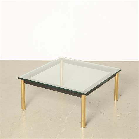 Tables and low tables, square and rectangular in shape, with polished trivalent chrome steel legs and steel (cr3) frame enamelled in semigloss grey, light blue, green, brown, mud and ivory. LC10-P coffee table by Le Corbusier for Cassina, 1980s ...