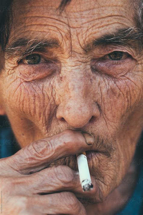 Old Woman Smoking Closeup by Borislav Zhuykov - Addiction, Elderly