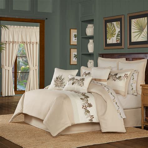The champagne center has diamond quilting, and the drop has dark red and blush vining rose embroidery. Palm Beach King 4 Piece Comforter Set