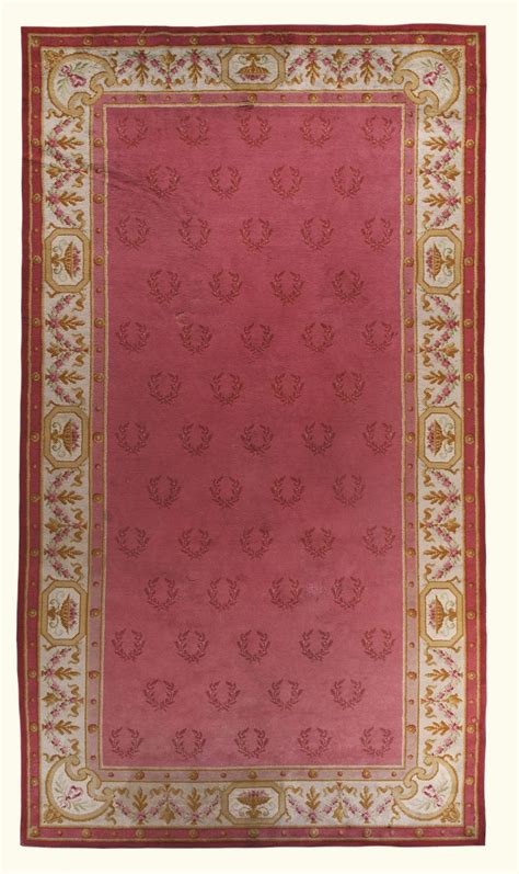 Which carpet pattern is right for you? A NEOCLASSICAL STYLE CARPET with a salmon coloured main ...