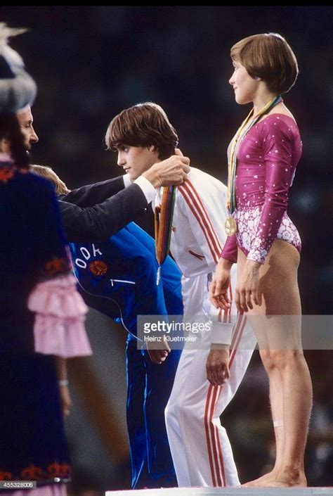 Nadia elena comăneci ˈnadi.a koməˈnet͡ʃʲ аудио (инф.); Nadia Comaneci y Yelena Davidova (1980) | Gimnasio, Nadia ...