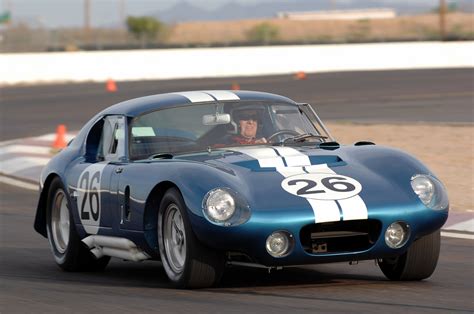 We can put a man on the moon and beat enzo ferrari at his own game. 1965 Shelby Daytona Cobra Coupe CSX2601 Photo Gallery ...