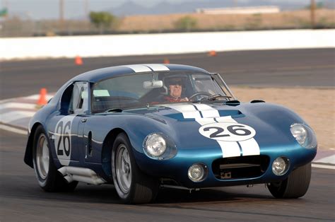 We can put a man on the moon and beat enzo ferrari at his own game. 1965 Shelby Daytona Cobra Coupe CSX2601 Photo Gallery ...