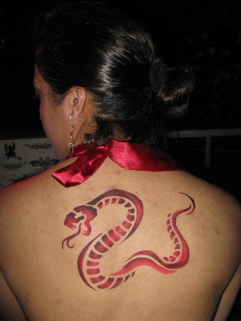 Home body art 20 snake body tattoo design. 20 Snake Body Tattoo Design - EntertainmentMesh
