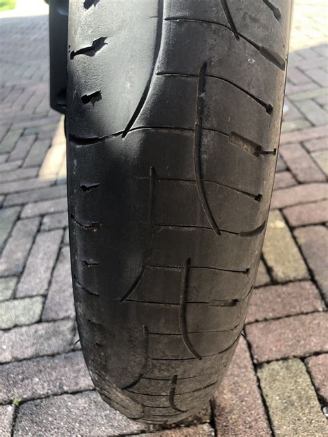 You need to substitute unevenly used tires with new ones. Uneven Tyre Wear | The Triumph Forum