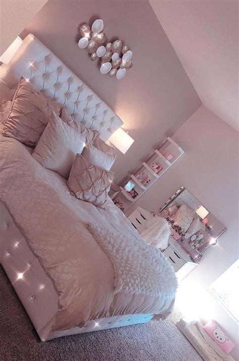 Selective focus of smiling woman with hair curlers holding smartphone while taking photo near mirror. 30+ Cute Pink Bedroom Design For Your Valentines Day ...