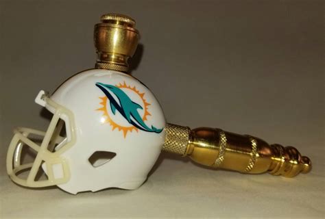 White with aqua & orange stripe across top, dolphins logo on side snack helmet dimensions: Miami Dolphins NFL Helmet Pipe Straight Design