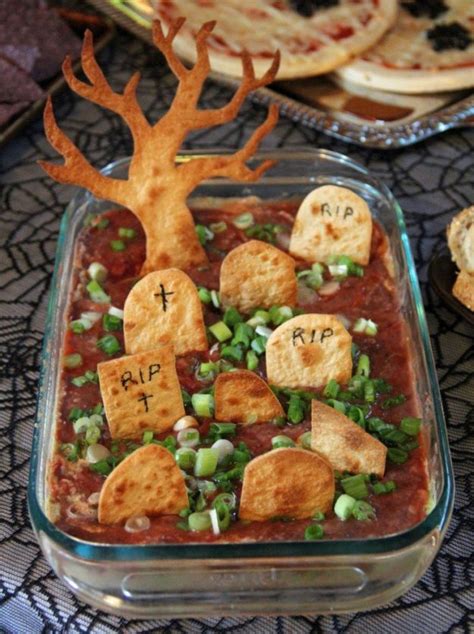 Halloween dinner party ideas dining room decor. 13 Fun and Spooky Halloween Party Food Ideas For Your ...