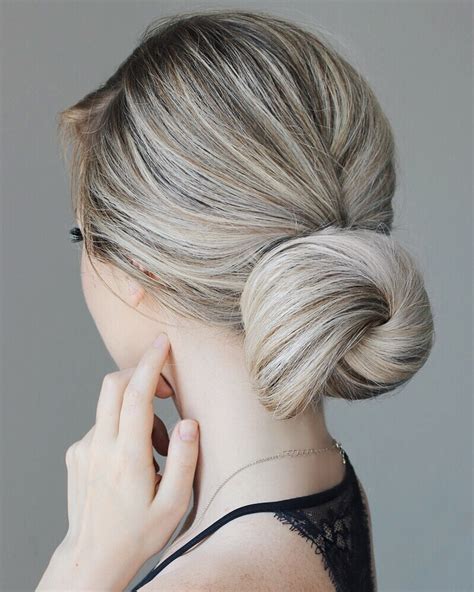 A trendy and cool hairstyle for women with afro hair is a bun with cornrows braided into it. Prom & Formal Events - Sue's Hair Design