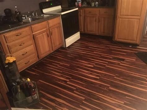 Trafficmaster allure planks get the attention they do because of the ease of use. TrafficMASTER African Wood Dark 6 in. W x 36 in. L Luxury ...