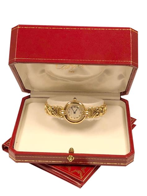 Delivery/return you may return or exchange your cartier creation within 30 days in a new and unused state, in perfect condition, with all protective materials in place and tags and stickers attached to them. Cartier Colisee Ladies Yellow Gold Bracelet Quartz Wristwatch For Sale at 1stdibs