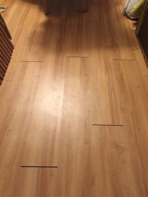 Luxury vinyl floor tiles are an elegant addition to any home and are also surprisingly durable. The vinyl plank click flooring I installed in two rooms ...