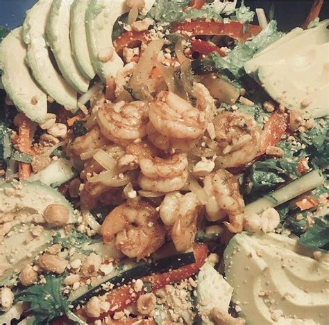 If you're in a hurry, you can use precooked shrimp for an easy weeknight dinner. Thai-inspired shrimp spring roll salad on kale. : HealthyFood