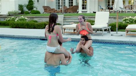 Party home video shot by friends. Teen Friends Have A Fun Chicken Fight At A Pool Party ...