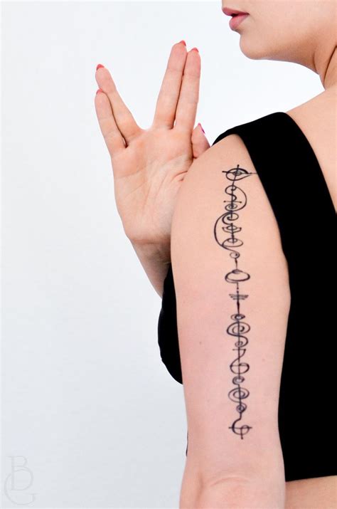 This design features classic elements from star trek the original series, along with our beloved spock's most infamous quote live long and prosper. Live Long and Prosper Vulcan Calligraphy Temporary Tattoo ...