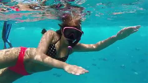 It really sparkles in summer. Snorkeling at Electric Beach, Oahu - YouTube