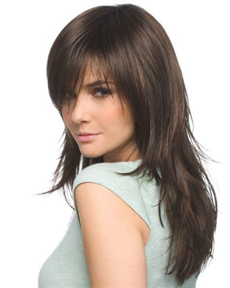 Although layers are traditionally used to frame the face, having a lot of subtle layers around the ends of your hair can look super spunky and fun and give. 2020 Popular Long Haircuts With Bangs And Layers For Round ...