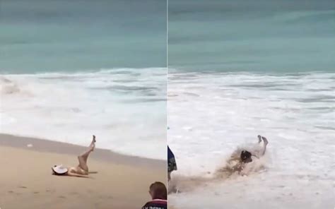 Elle se tape un nain. Elle tape la pose sur la plage et se prend une énorme ...