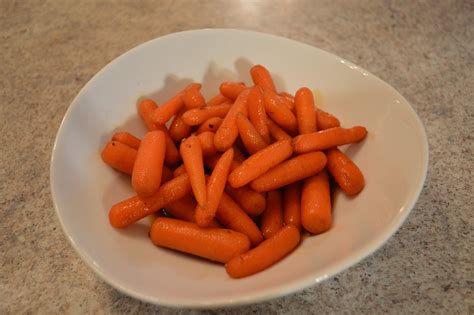 Cook over low heat for just a few minutes, stirring gently. How to Cook Brown Sugar Glazed Baby Carrots: Cooking with ...
