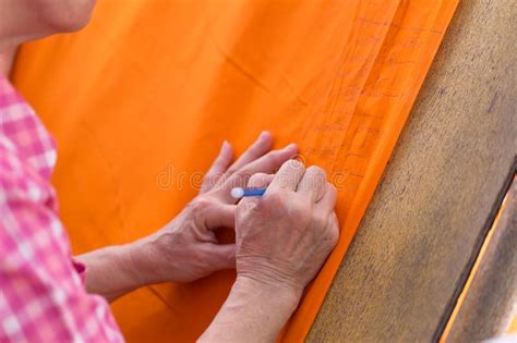 Explain their donation in terms of numbers. Buddhist People Make Donation And Write Their Name In Buddha Cloth Editorial Stock Image - Image ...