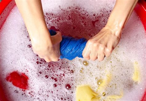 Wash deep colored clothing like indigo jeans or red sweatshirts by themselves for the first few washings. Women Washing Color Clothes In Basin Enemale Powdered ...