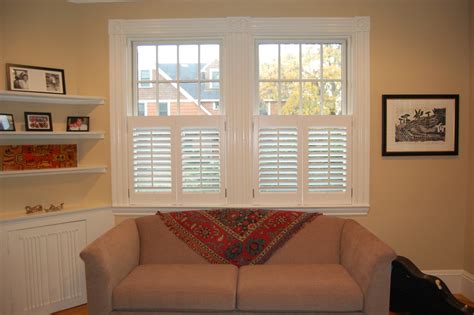 Natural hardwood shutters in full height, natural wood stain and 64mm slats with hidden tilt rod. Plantation Shutters - Traditional - Living Room - Boston ...