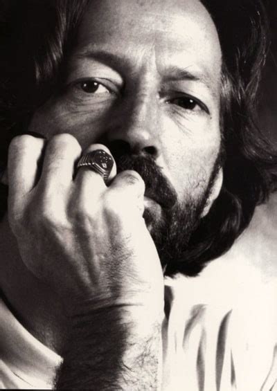 Hit the tweet button at the top ↑ 2. Picture of Eric Clapton