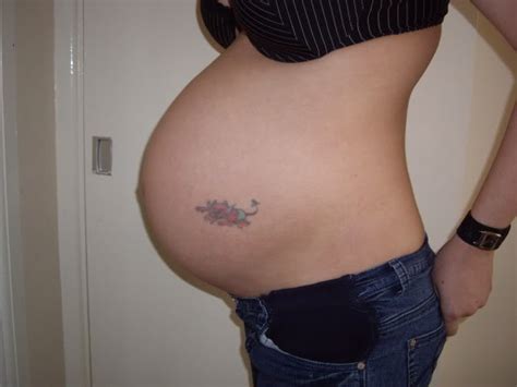 Is it normal for tattoos to stretch during pregnancy? Angel and Art Tattoos: Stretched Tattoos After Pregnancy ...