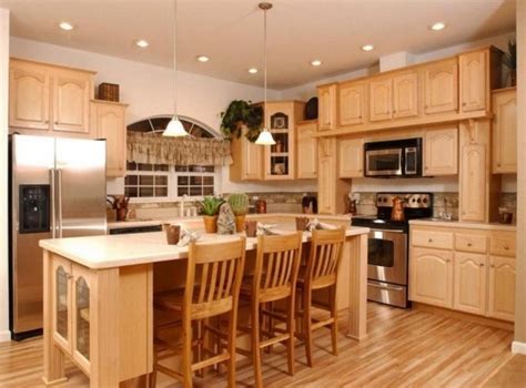 For especially dark cabinets like ebony or mahogany, select a lighter paint color for your walls to open up and the paint color you choose for your kitchen will depend on what you are striving to accomplish with the room. Best Paint Color For Kitchen With Honey Colored ...