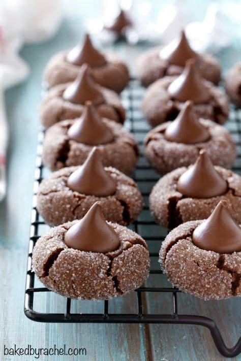 When i asked my husband what his ideal christmas goodie plate looks like he said, snowball cookies, sugar cookies, some kind of fudge, peanut butter cup cookies, and divinity. Chocolate Blossom Christmas Cookies With Hershey Kisses #Holiday Recipes | Chocolate kiss ...